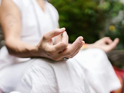 Hands in a mudra position close up